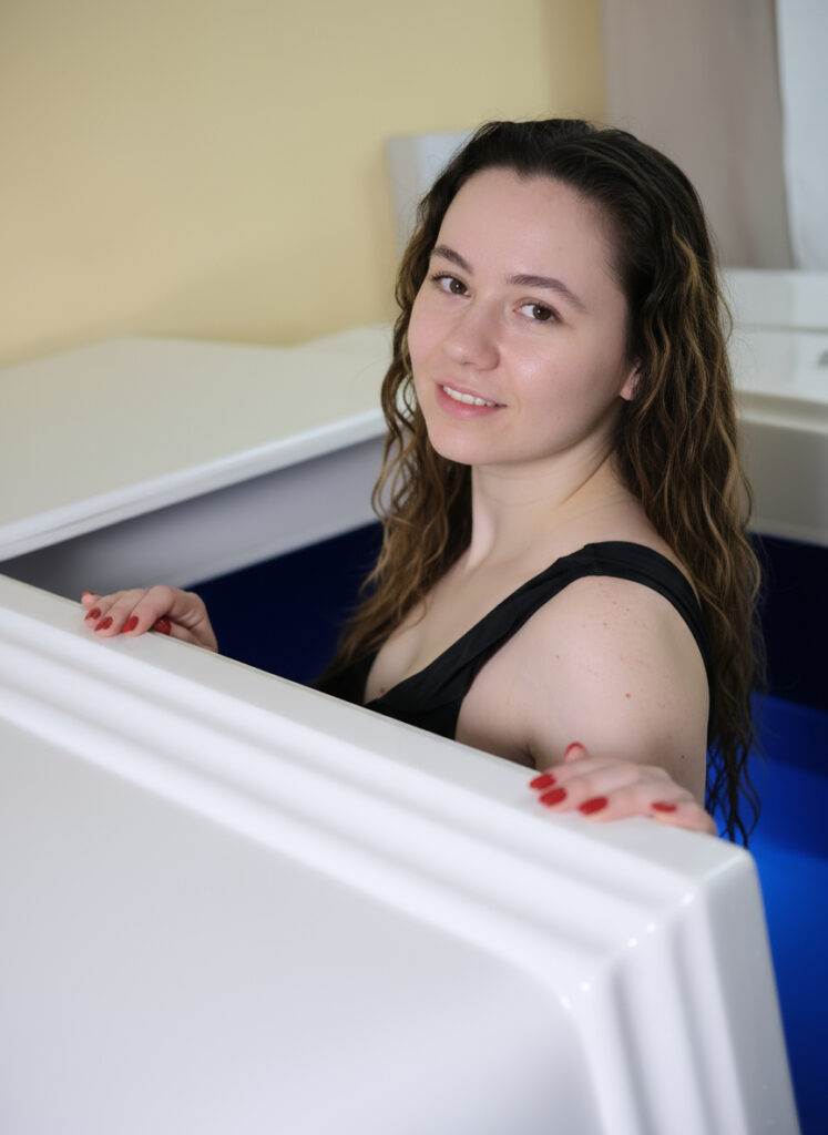 Spacious dark blue interior of Restingwell Spirit floatation tank – minimizes light reflection and visual noise for faster deep meditation, sensory isolation, and ultimate calm